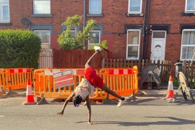 child doing a cartwheel