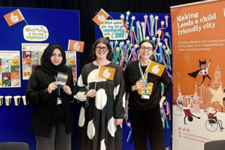 Child Friendly Leeds staff at an information stall