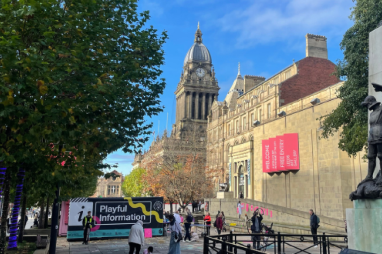The public playing outside Leeds Central Library