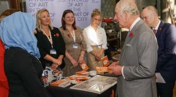 King Charles meeting several members of the Child Friendly Leeds team