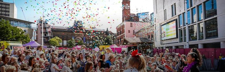 Large crowd of people celebrating